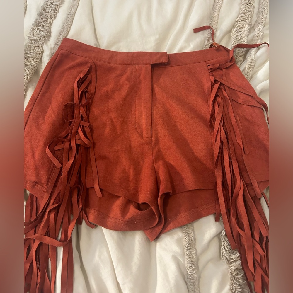 Orange fringe shorts